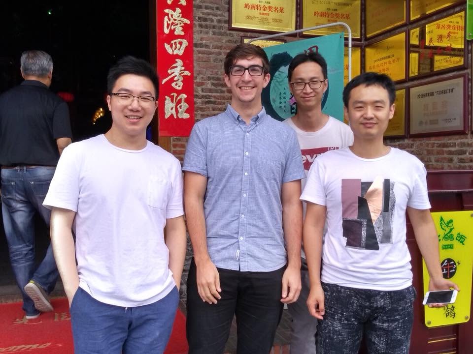 Alex with friends in China